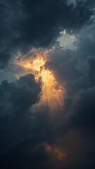 Fototapeta premium Sun Rays Breaking Through Dramatic Clouds