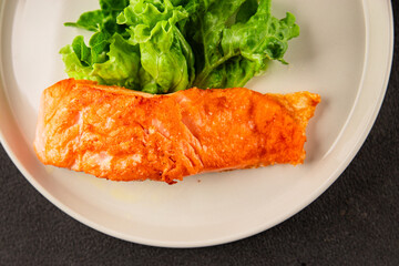 salmon fried fish seafood second course tasty snack fresh delicious gourmet food background on the...