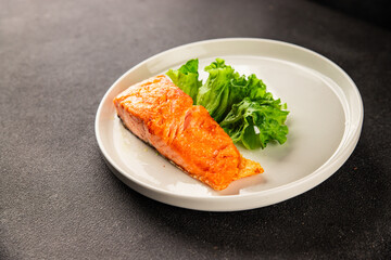 salmon fried fish seafood second course tasty snack fresh delicious gourmet food background on the...