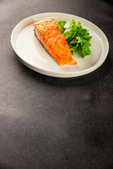 salmon fried fish seafood second course tasty snack fresh delicious gourmet food background on the table rustic food top view copy space pescetarian diet