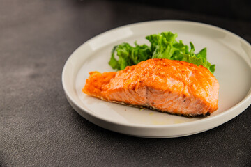 salmon fried fish seafood second course tasty snack fresh delicious gourmet food background on the...
