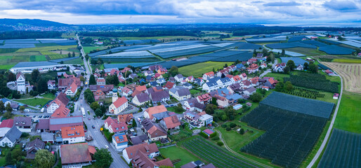 Aerial view of the village Ittendorf in Germany on a cloudy day in summer