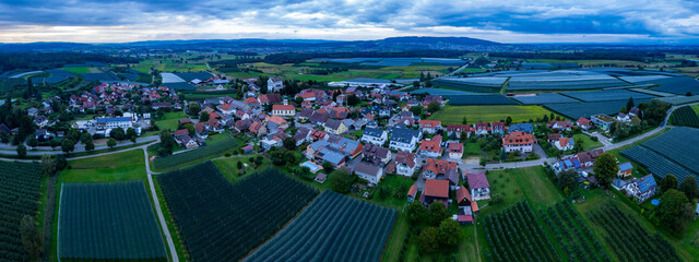 Aerial view of the village Ittendorf in Germany on a cloudy day in summer