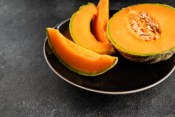 Melon Charente ripe sweet fruit tasty snack fresh delicious gourmet food background on the table rustic top view copy space keto and paleo diet vegan and vegetarian food