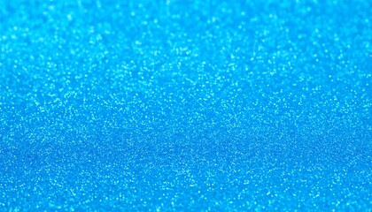 Obraz premium A vibrant, textured surface displays a brilliant, light-catching azure blue.