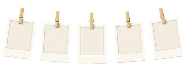 Four empty white photo frames with wooden clothespins