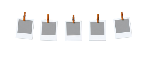 Five blank instant photos hanging