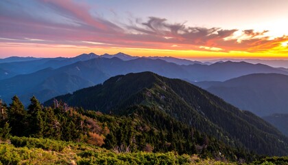 Fototapeta premium Majestic Layers: Mountain Range Vista at Colorful Sunset Hour