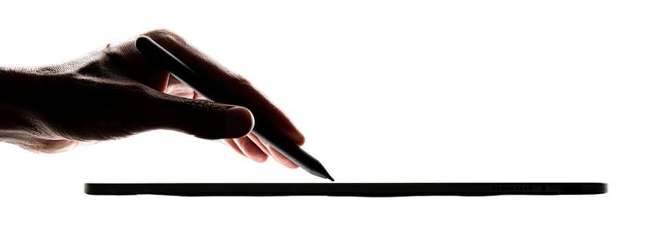 Hand holding stylus over a tablet (1)