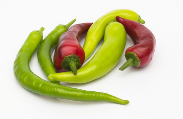 Chili peppers assorted on white background