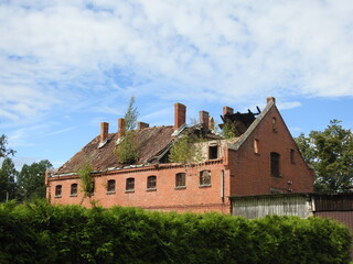 an old german warehouse with a demolished roof