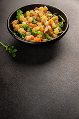 Potato salad with smoked fish tasty snack fresh delicious gourmet food background on the table rustic food top view copy space
