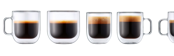 Glass espresso cups with varying crema layers