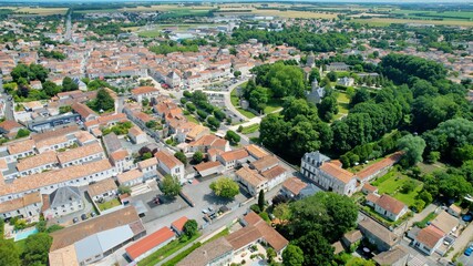 Obraz premium Aerial panorama view around the old town in the city Surgères in France, on a sunny summer noon