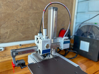 Modern 3d printer creating objects with additive manufacturing technology