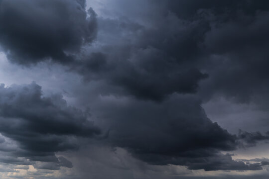 Epic Dramatic Storm sky with dark grey cumulus rainy clouds abstract background texture, thunderstorm