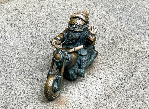 Wrocław, Poland, July 22, 2025: Gnome Wentyl (Motorcyclist) on Szewska Street in Wroclaw. Dwarfs &ndash; small figurines, a tourist attraction in Wroclaw