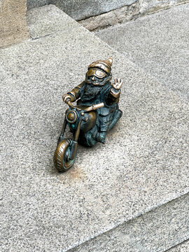 Wrocław, Poland, July 22, 2025: Gnome Wentyl (Motorcyclist) on Szewska Street in Wroclaw. Dwarfs &ndash; small figurines, a tourist attraction in Wroclaw