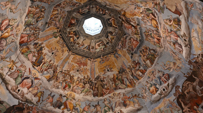 Daylight Shining Through The Ceiling Painting In The Dome Of The Cathedral Of Florence Italy
