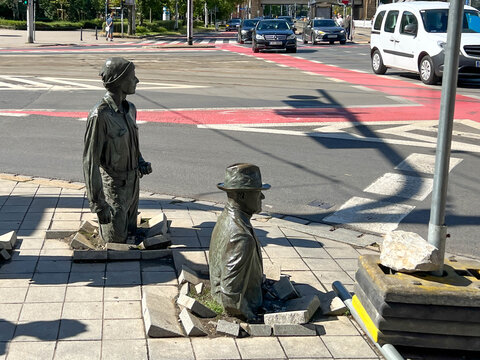 Wroclaw, Poland, July 22, 2025: The Jerzy Kalina Anonymous Passerby Monument at the corner of Swidnicka Street and Marshal Pilsudski Street in Wroclaw, Poland