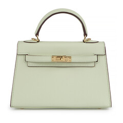 Luxury light beige leather handbag with structured design and gold lock, Kelly-inspired accessory