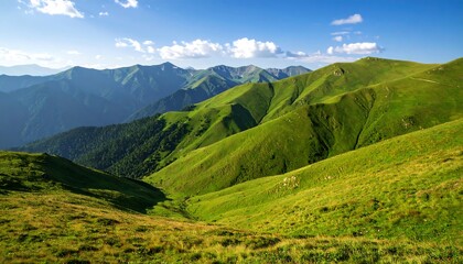 Fototapeta premium Lush green hillsides under a bright blue sky provide a serene and vibrant mountain landscape