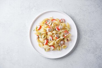 Imitation crab sticks pasta in a plate © nata_vkusidey