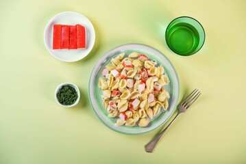 Imitation crab sticks pasta in a plate © nata_vkusidey