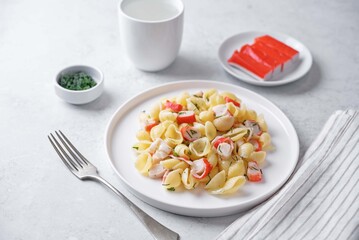 Imitation crab sticks pasta in a plate © nata_vkusidey