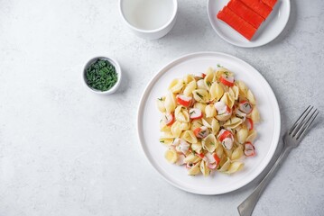 Imitation crab sticks pasta in a plate © nata_vkusidey