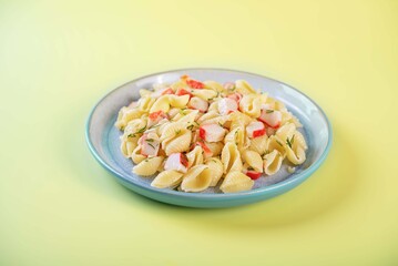 Imitation crab sticks pasta in a plate