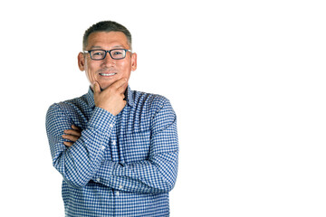 Middle-aged smiling handsome asian man with glasses holding chin isolated on white background