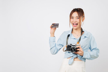 Travel woman holding credit card bank and camera ready for summer travel. Happy Asian Traveler...