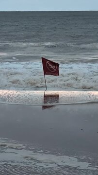 Queens, New York - August 21 2025: Hurricane Erin at Rockaway Beach - No Swim Flag In Surf