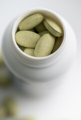 Close up of Sulforaphane Supplement Tablets on White Background