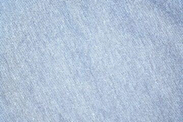 Close up of soft blue fabric with textured fine grain knit pattern