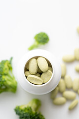 Close up of Sulforaphane Supplement Tablets on White Background