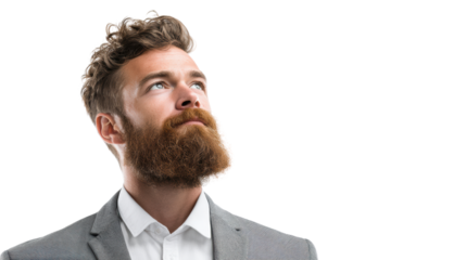 Businessman with beard looking upwards, isolated on white background, thoughtful expression