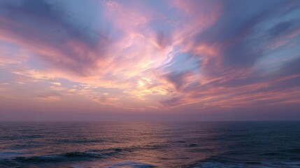 Obraz premium Serene Ocean Sunset Pink and Purple Sky over Calm Waters