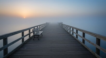 Fototapeta premium A serene wooden pier extends into the tranquil sea at sunset, its walkway leading toward the stunning horizon