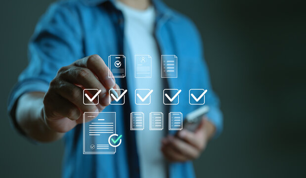 Man interacting with digital checklist interface for document approval and task management. Online form submission, workflow automation and productivity concept in modern business. - Powered by Adobe