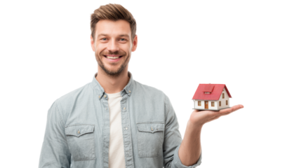 A smiling man holding a miniature house model in hand, showcasing real estate concept.
