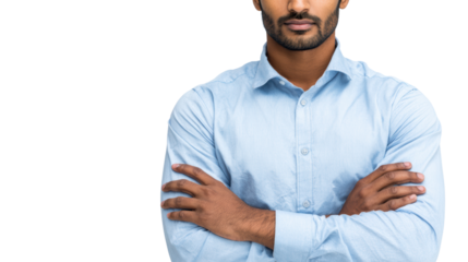 Confident man with arms crossed, wearing a light blue shirt, isolated on a white background.