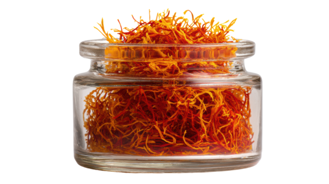 Saffron threads in a glass jar, vibrant orange color on a white isolated background.