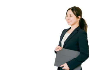 タブレットPC・ノートパソコンを持つアジア人ビジネスウーマン
