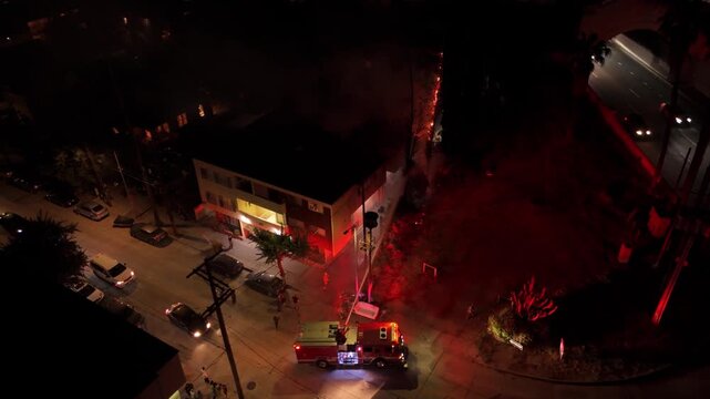 4K Drone Night Video of Firefighters Extinguishing Tree Fire Caused by Fireworks in Los Angeles &ndash; LA Wildfire Emergency, July 4th Independence Day Fire Accident, California Firefighters in Action