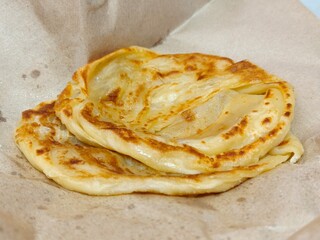 Close-up of Roti Canai Breakfast Food. Malaysian cuisine 
