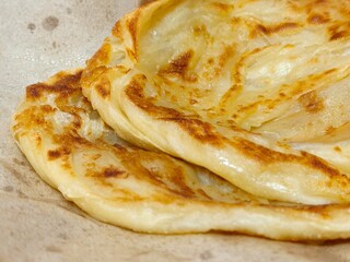 Close-up of Roti Canai Breakfast Food. Malaysian cuisine 