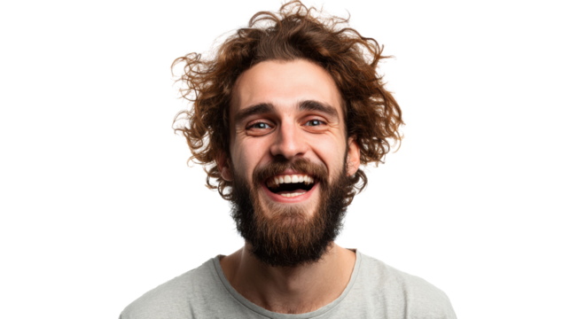 Joyful man with curly hair laughing against a white background.