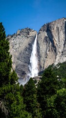 Majestic waterfall cascading down granite cliffs (4)